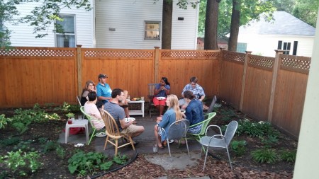 BSS students and faculty chatting during their party on Sunday. The pup, Stout by name, took a very intelligent interest in proceedings.